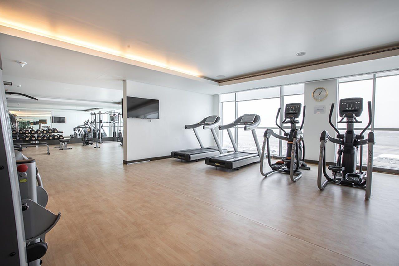 Royal M Al Aqah Beach Resort By Gewan Kültér fotó The gym at the hotel