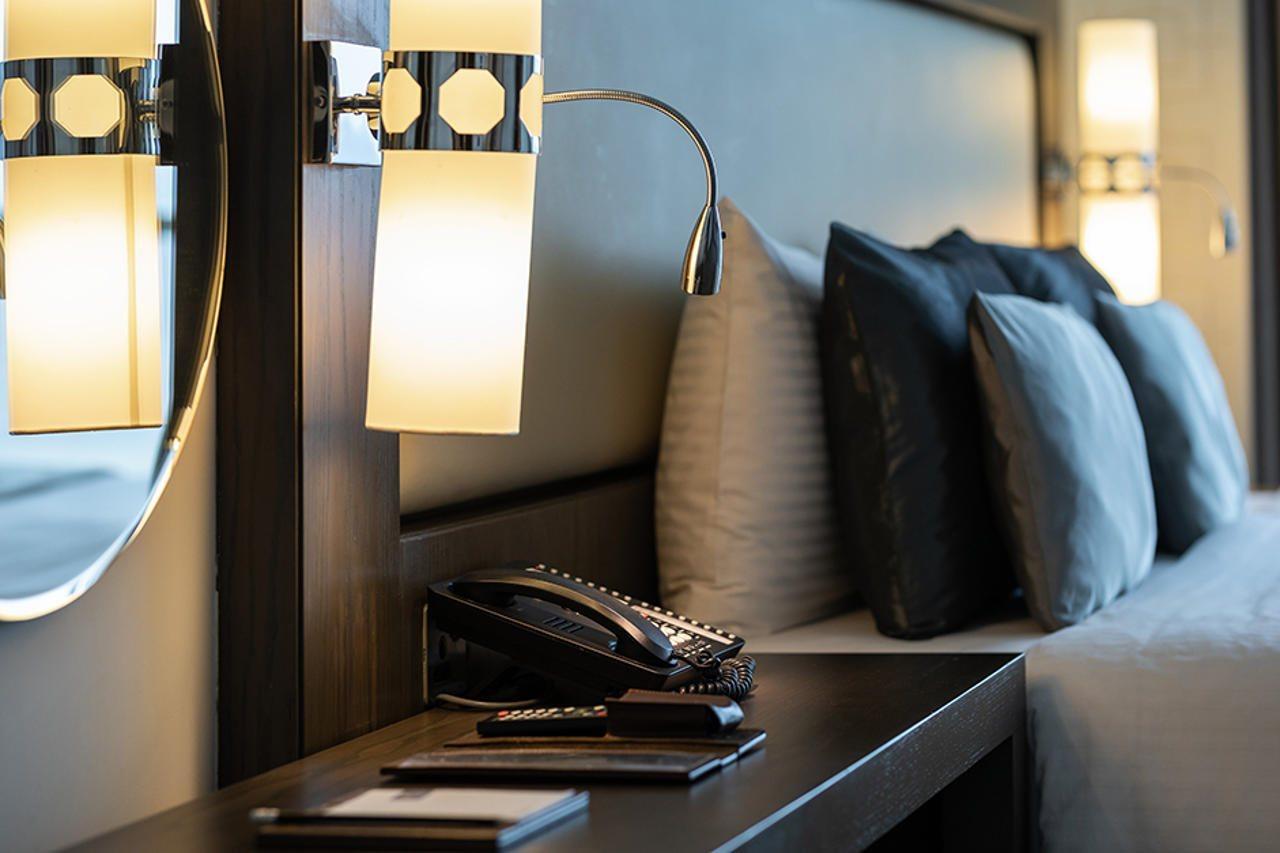 Royal M Al Aqah Beach Resort By Gewan Kültér fotó A telephone in a hotel room