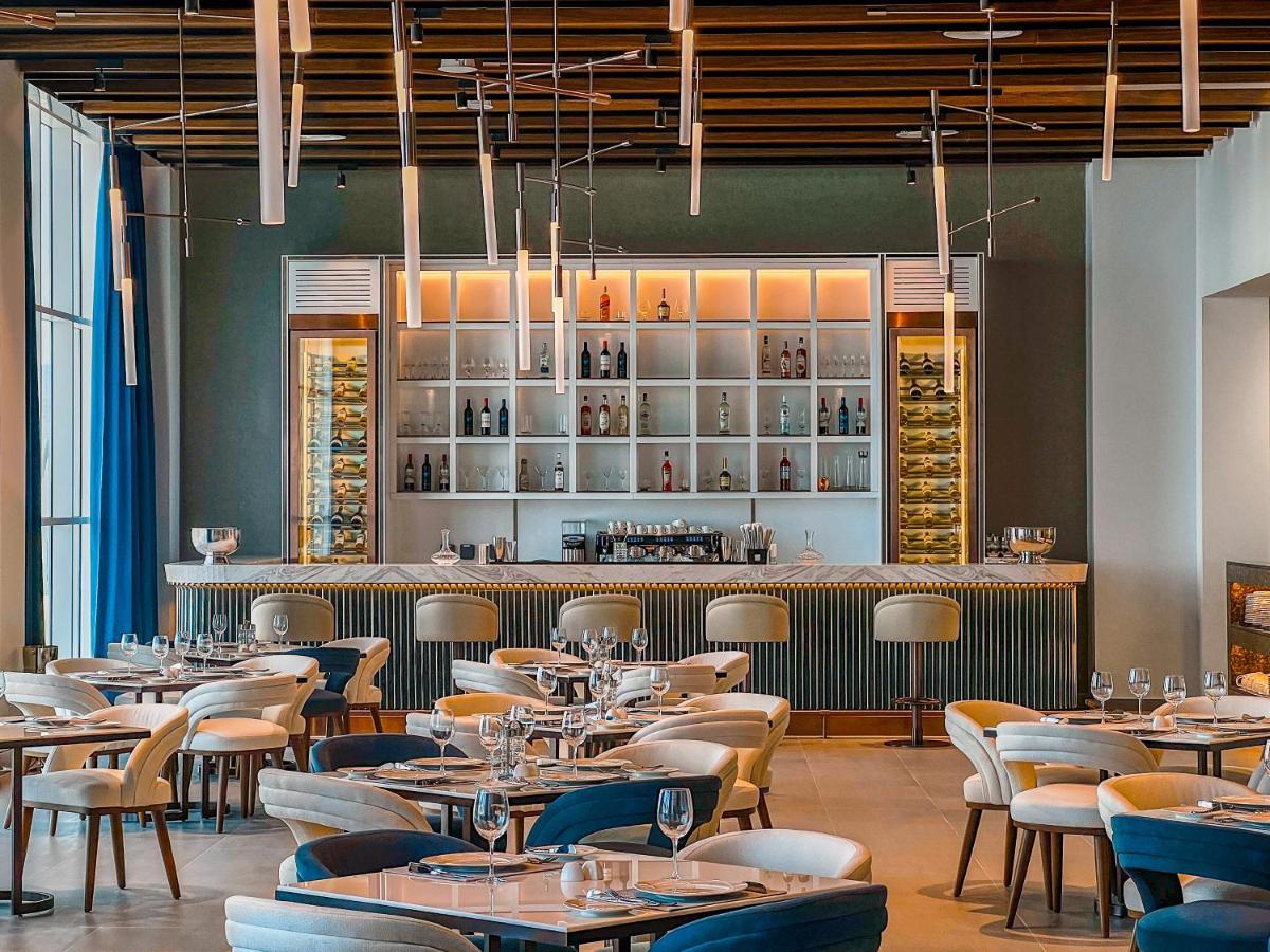 Royal M Al Aqah Beach Resort By Gewan Kültér fotó The restaurant's interior