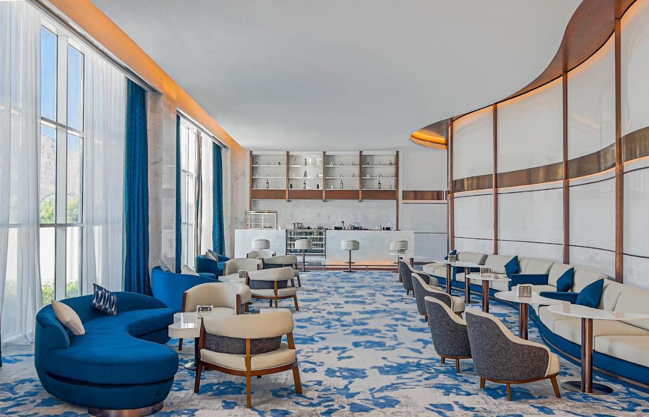 Royal M Al Aqah Beach Resort By Gewan Kültér fotó The Lounge at the airport