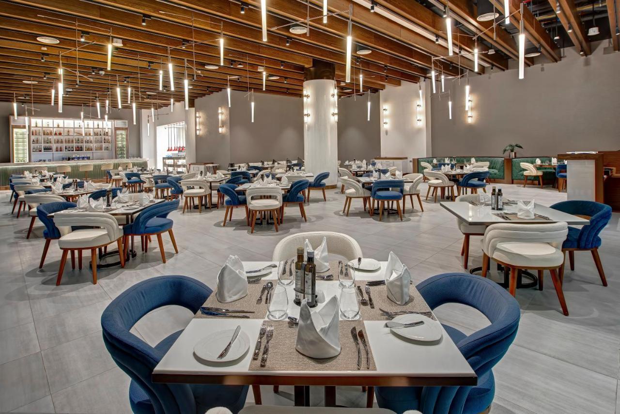 Royal M Al Aqah Beach Resort By Gewan Kültér fotó The restaurant
