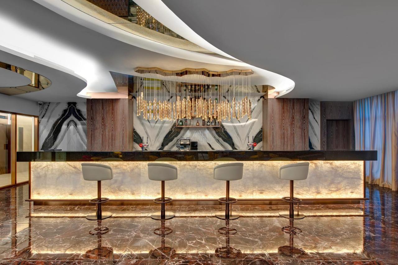 Royal M Al Aqah Beach Resort By Gewan Kültér fotó The bar at the 101 lounge