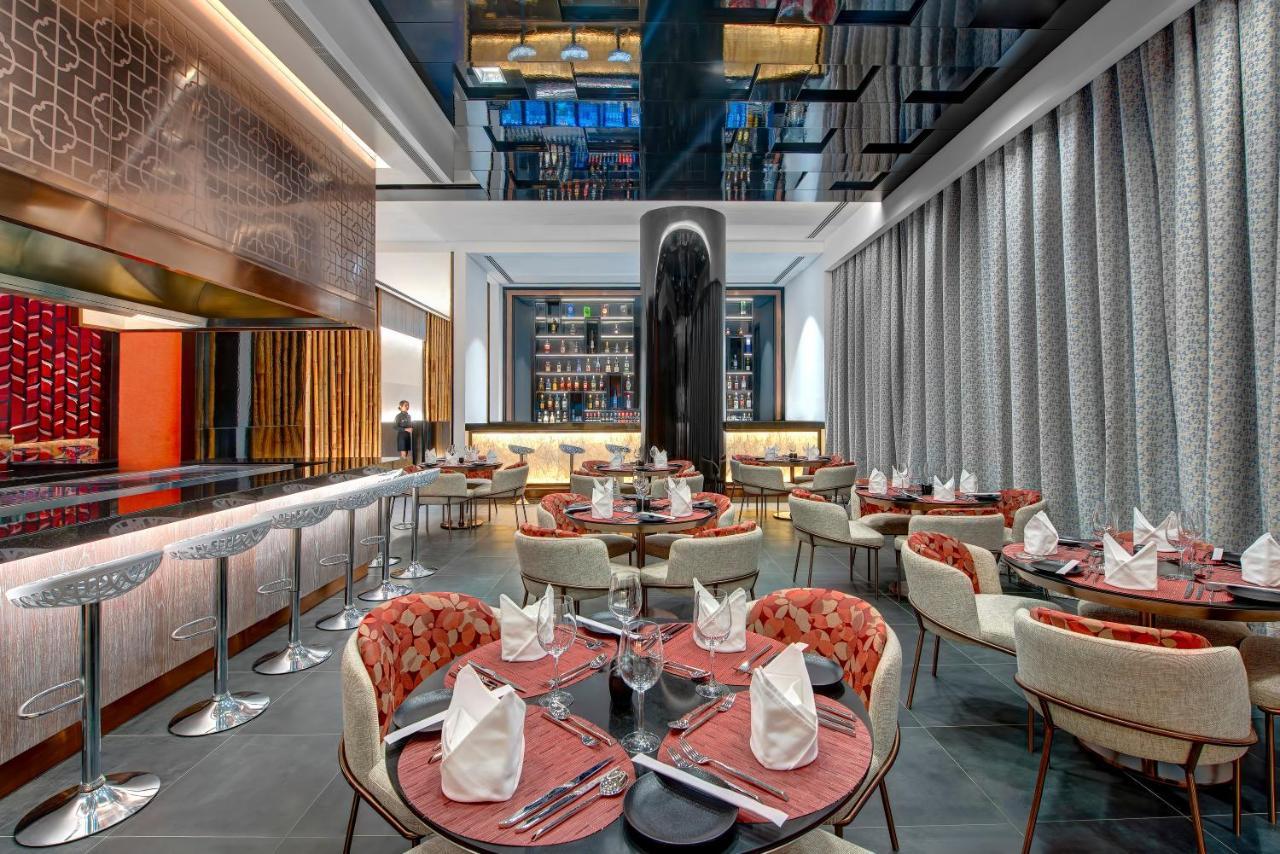 Royal M Al Aqah Beach Resort By Gewan Kültér fotó The interior of the restaurant