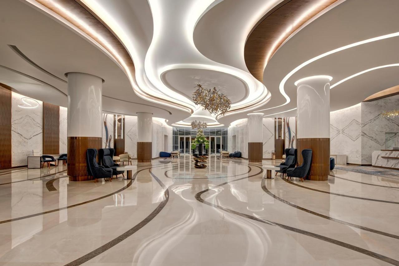 Royal M Al Aqah Beach Resort By Gewan Kültér fotó The lobby of the hotel