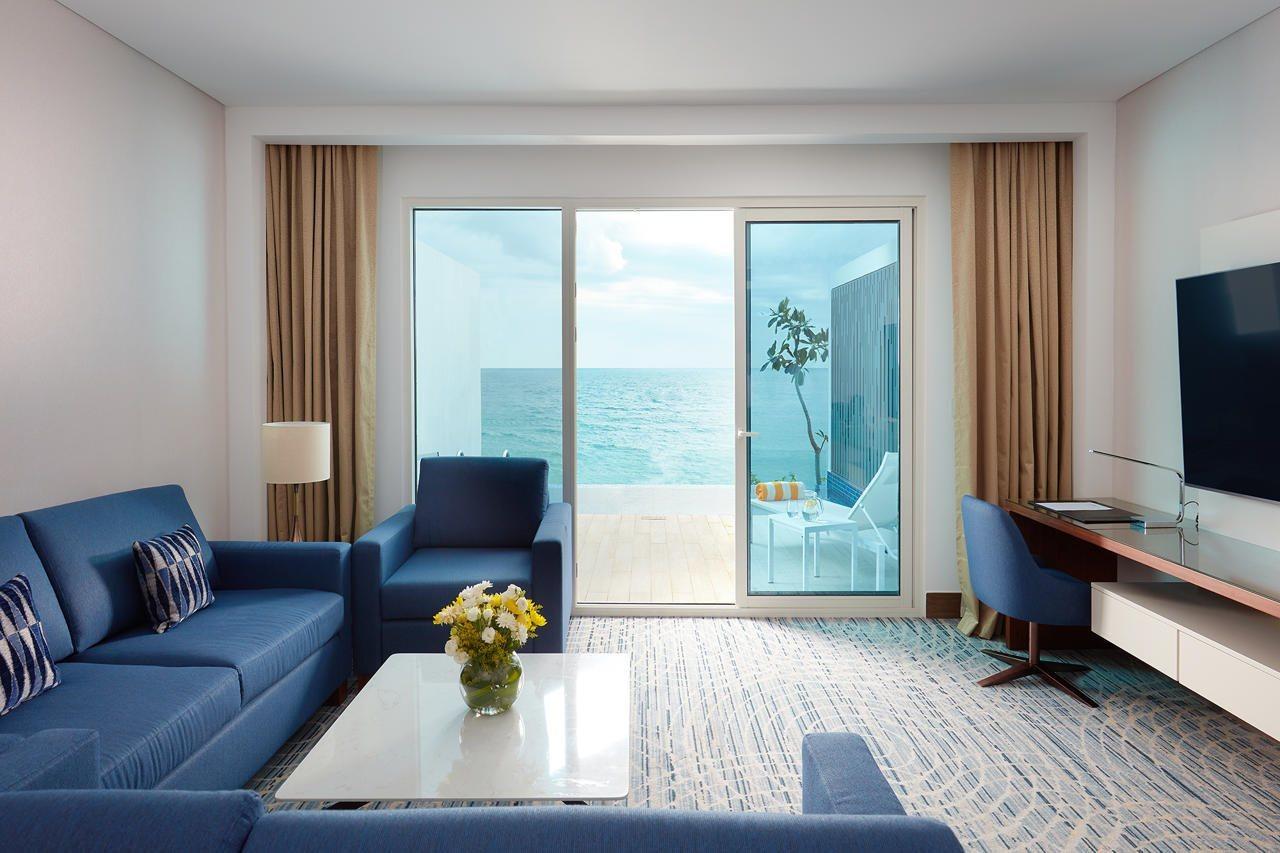 Royal M Al Aqah Beach Resort By Gewan Kültér fotó A suite at the hotel