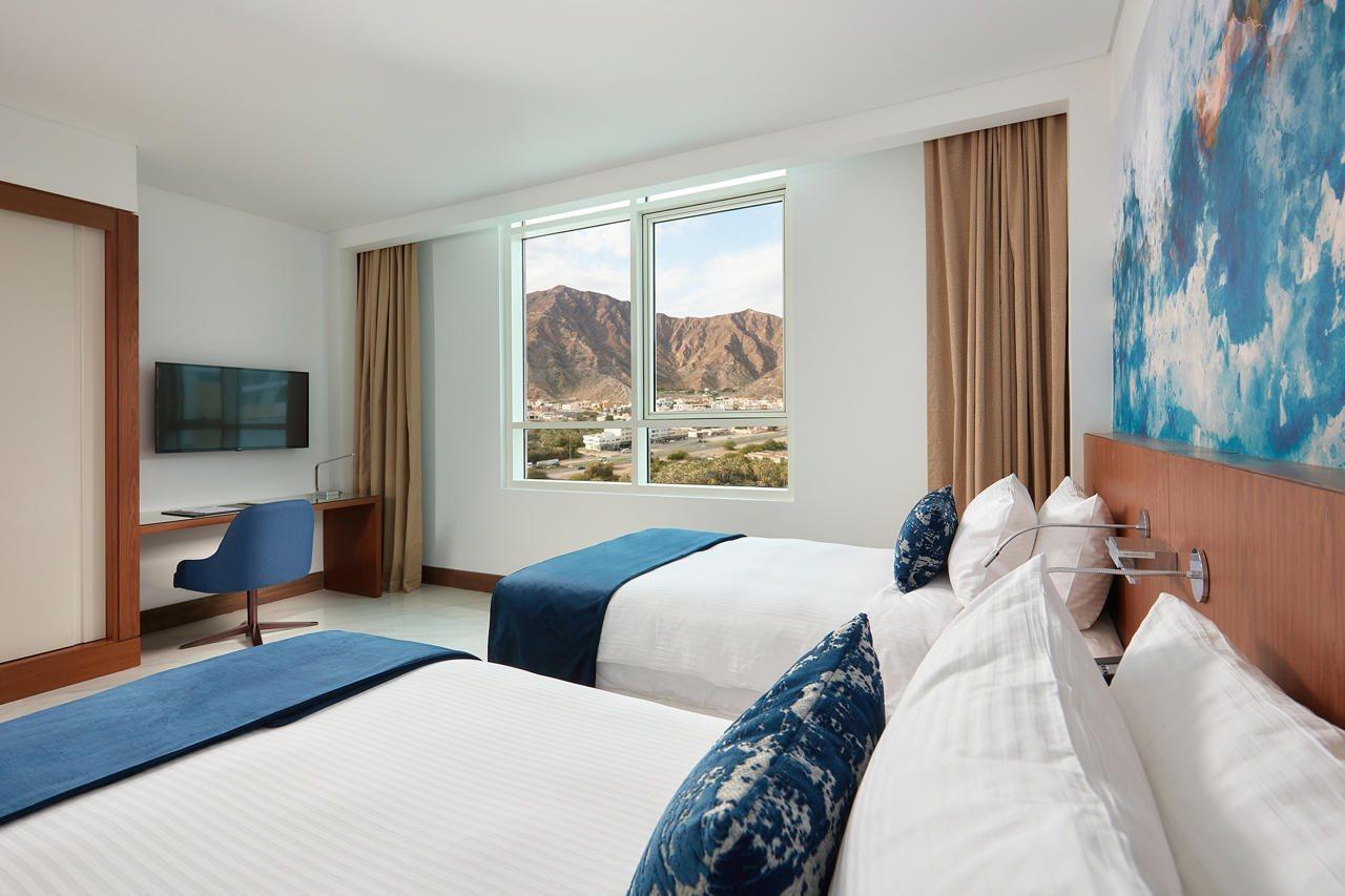 Royal M Al Aqah Beach Resort By Gewan Kültér fotó A room at the hotel