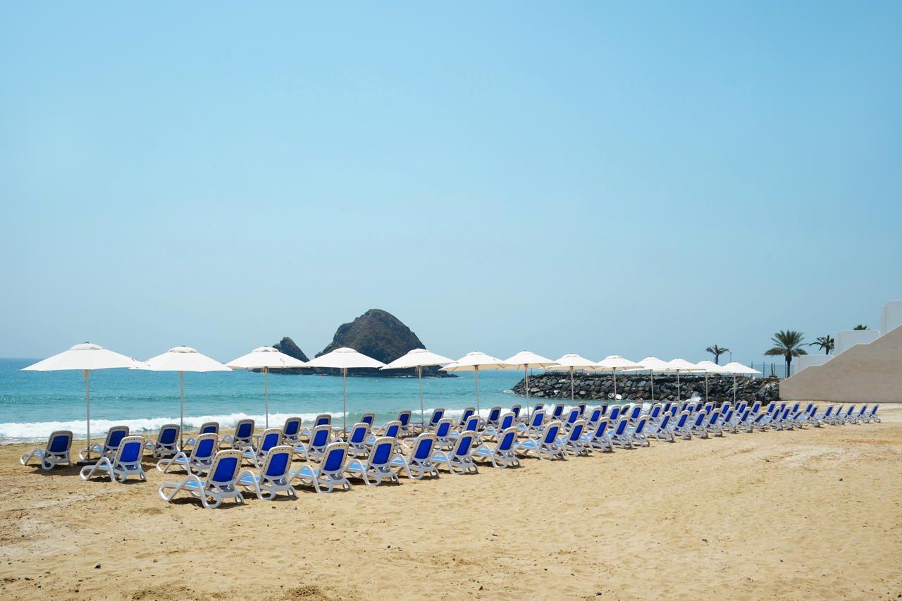 Royal M Al Aqah Beach Resort By Gewan Kültér fotó The beach at the Grand Hotel